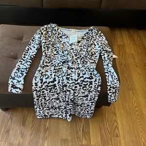 This beautiful black and white over the knee Long Sleeve Dress never worn.